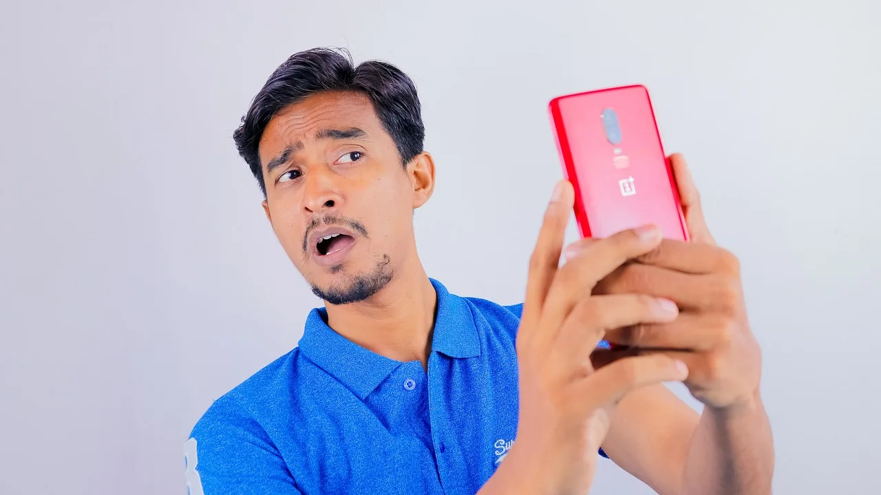 man, selfie, smartphone, cellphone, mobile phone, portrait, selfie, selfie, selfie, selfie, selfie. FTC endorsement guides for American creator posts and licensed image reuse
