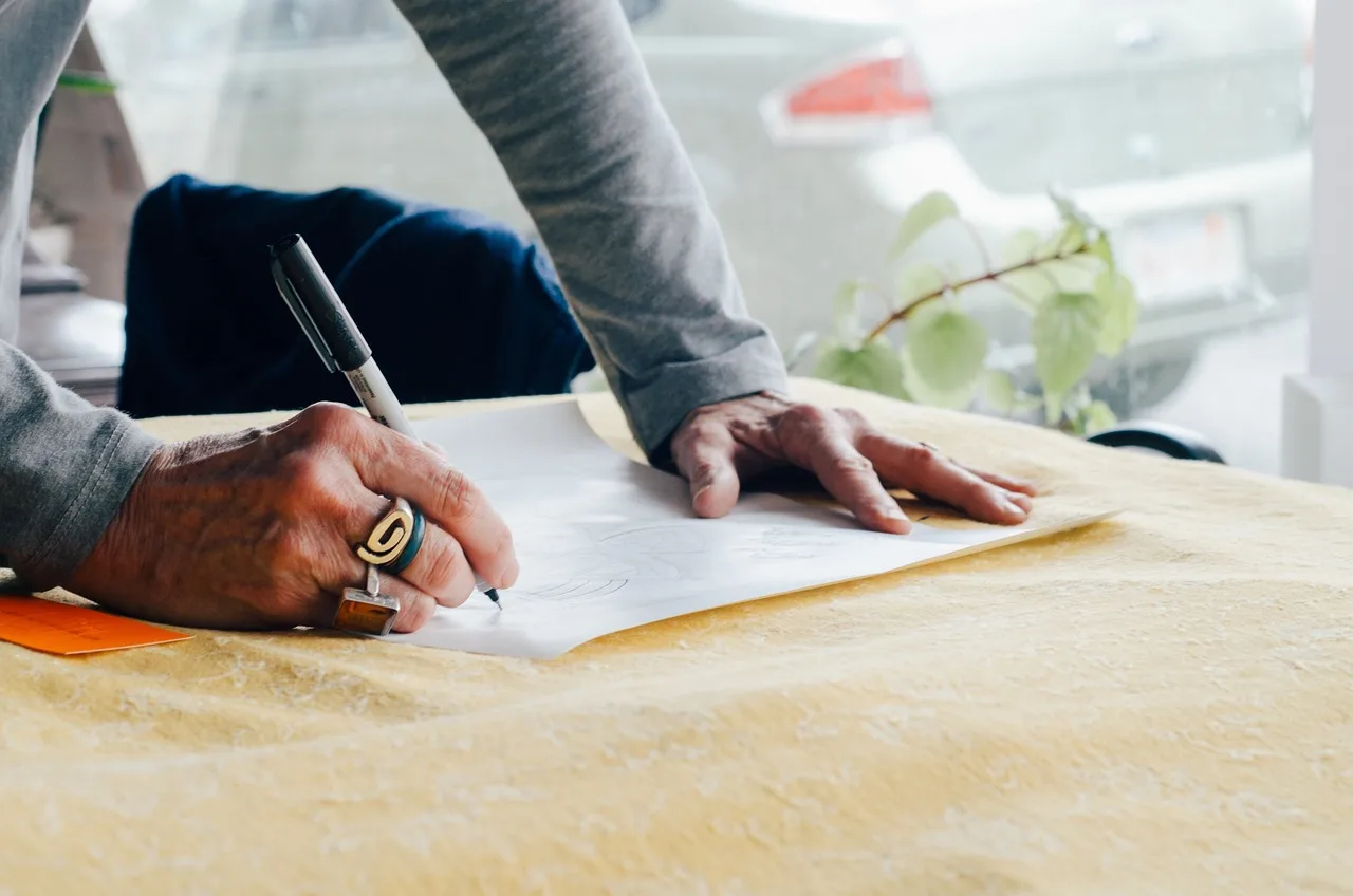 people, man, writing, paper, pen, plan, hand, ring, table, office. How to write a one page strategy and objectives plan